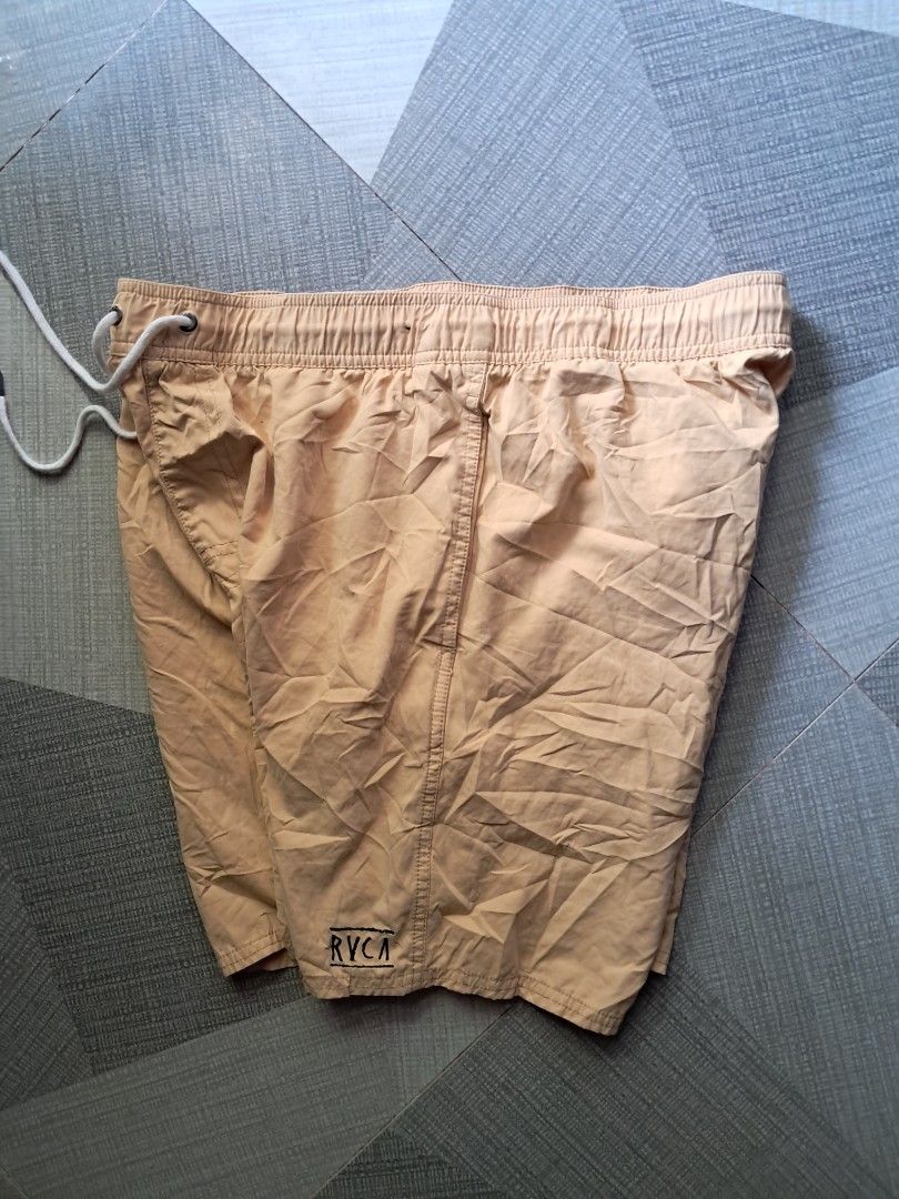 RVCA Yellow Boardshorts Size L (Category: Swim Trunks & Board Shorts) located in Cebu City. Submitted by chill_zy (Listing ID 1465808762, Image 1). Description: - Brand: RVCA - Color: Vibrant Yellow - Size: L - Waistband: Elastic with adjustable white drawstring - Pockets: Convenient back pocket with secure velcro flap and brand patch - Interior: Comfortable mesh lining - Ideal for: Beach days, swimming, or casual everyday wear - Condition: Excel