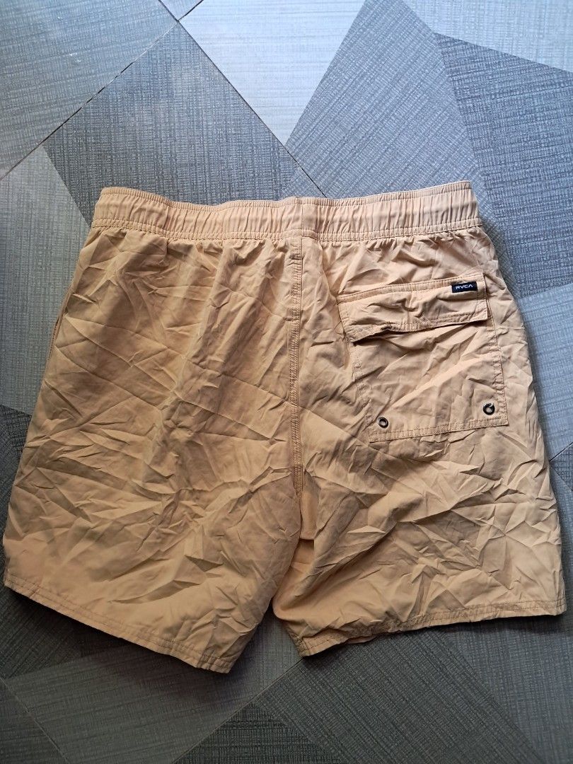 RVCA Yellow Boardshorts Size L (Category: Swim Trunks & Board Shorts) located in Cebu City. Submitted by chill_zy (Listing ID 1465808762, Image 3). Description: - Brand: RVCA - Color: Vibrant Yellow - Size: L - Waistband: Elastic with adjustable white drawstring - Pockets: Convenient back pocket with secure velcro flap and brand patch - Interior: Comfortable mesh lining - Ideal for: Beach days, swimming, or casual everyday wear - Condition: Excel