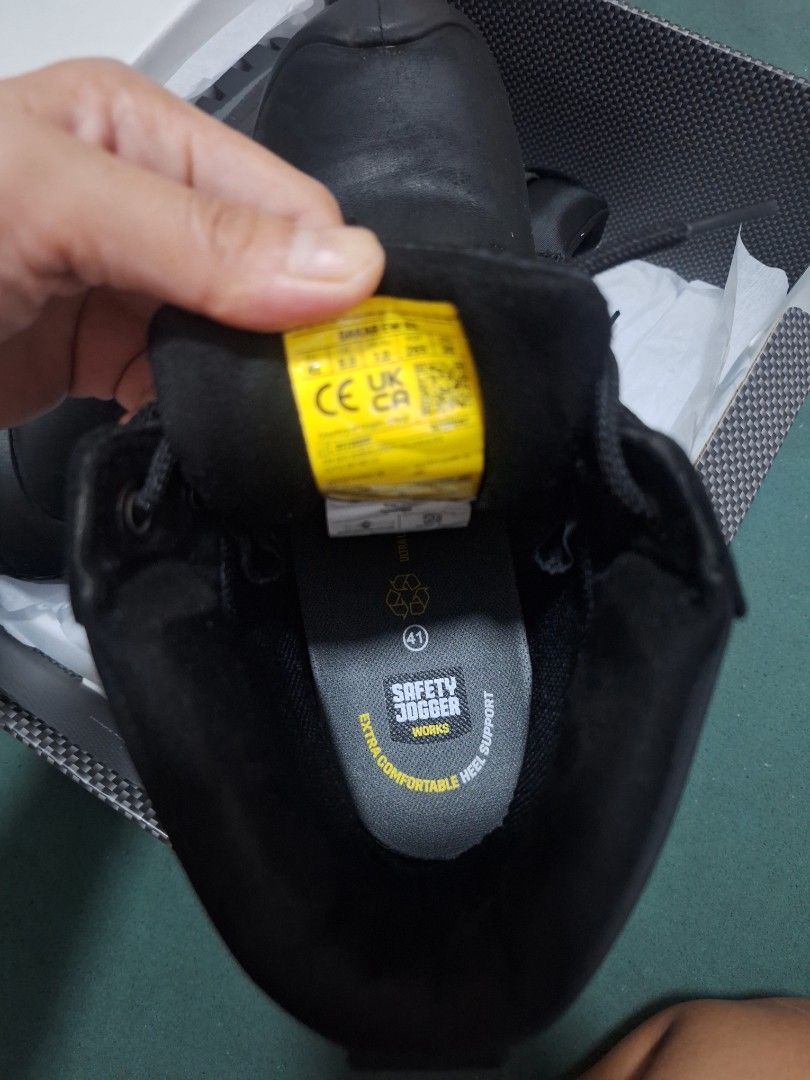 Safety Jogger Shoes (Category: Boots) located in Marikina City. Submitted by everbloom28 (Listing ID 1465880426, Image 3). Description: FOR SALE: Safety Jogger Shoes - Colorway: Black and grey - Size: EU 41 - Condition: Brand new, unworn, comes in original patterned box with yellow tag attached - Safety: Protective toe cap and certified slip resistance - Comfort: Comfortable footbed with built-in heel support Reason for selling: Wrong Size Price: