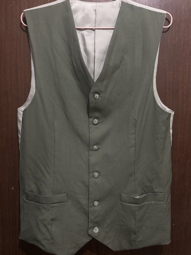 Sage Green Vest (Category: Others Tops) located in Las Pinas. Submitted by unofashion (Listing ID 1465936586, Image 1). Description: Green Vest Custom Made No longer fits Fits L-XL Dimensions: Bust - 37-38in Length - 25in (shoulder to bottom) Shoulder - 14in Tags: Vest Corporate Attire Zara Mango .