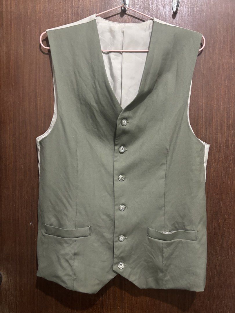 Sage Green Vest (Category: Others Tops) located in Las Pinas. Submitted by unofashion (Listing ID 1465936586, Image 3). Description: Green Vest Custom Made No longer fits Fits L-XL Dimensions: Bust - 37-38in Length - 25in (shoulder to bottom) Shoulder - 14in Tags: Vest Corporate Attire Zara Mango .