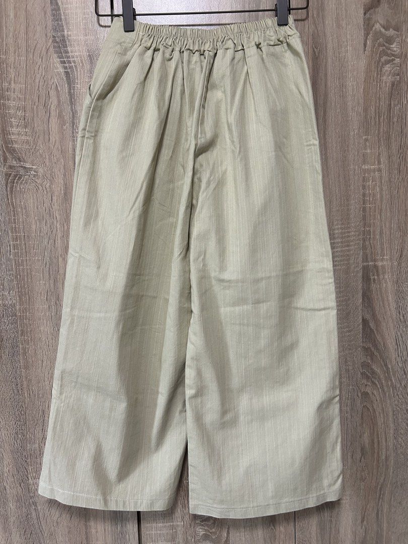 Sage Green Wide-Leg Culottes (Category: Other Bottoms) located in Bulacan. Submitted by relove.re (Listing ID 1465902391, Image 2). Description: Chic and effortlessly classy sage green culottes/palazzo pants featuring: * Size S * High-waist design * Front button detailing * Wide-leg, cropped silhouette * Lightweight fabric — perfect for casual or smart-casual looks * Neutral sage green shade, easy to style ✨ Very good condition Perfect for pairin