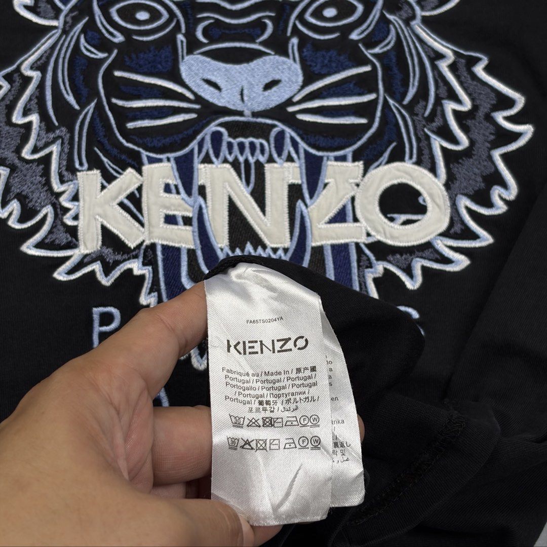 (Sale)Kenzo Embroidered Logo (Category: Luxury Apparel) located in Cavite. Submitted by onebeancent (Listing ID 1459279754, Image 3). Description: 🔘Kenzo Size: Large Frame Dimension: 21" Width | 28" Length Color: Black Color Rate: 9.8/10 Issue: None Condition: Excellent to New Before: 680php Now: 480php Additional Shipping Fee (J&T Small Pouch) 75php Luzon 100php visayas 120php mindanao.