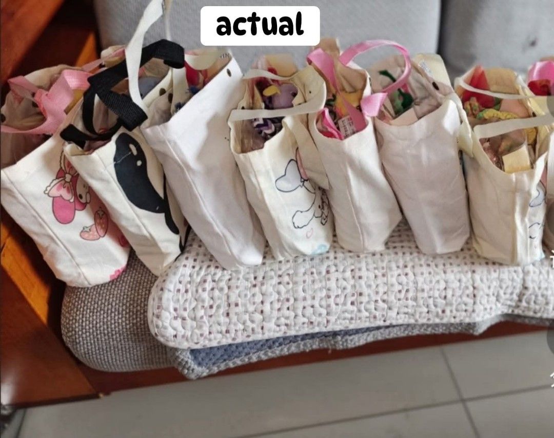 Sanrio gift bags (Category: Babies & Kids Fashion) located in San Juan City. Submitted by proverbs.31woman (Listing ID 1465786824, Image 3). Description: re-usable gift bag , canvass.