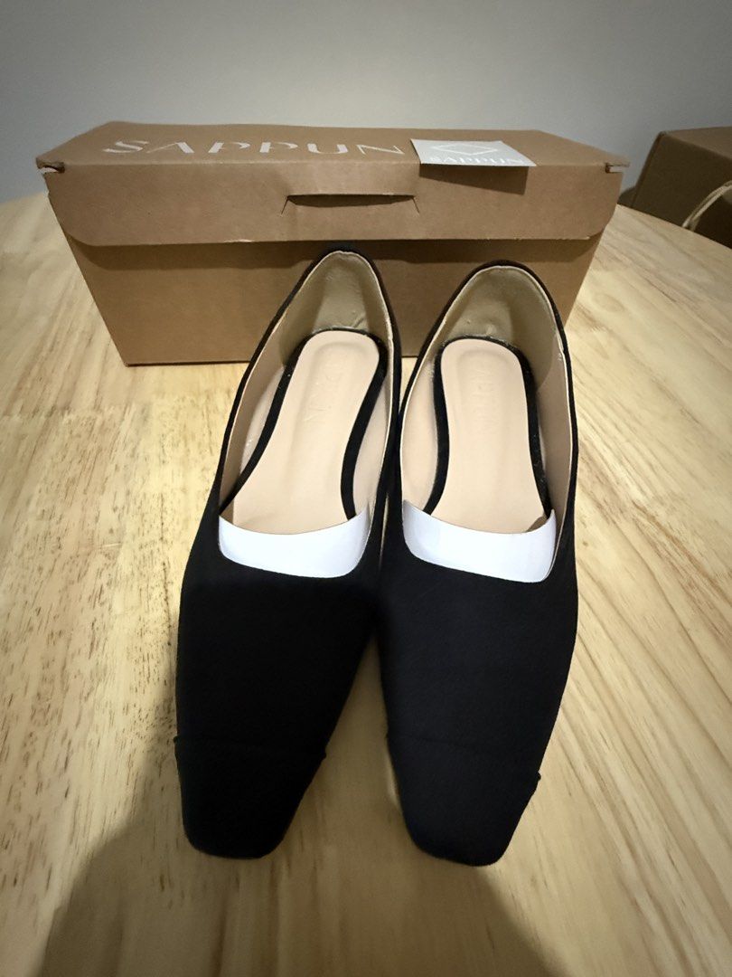 Sappun Black Square Toe Flats (Category: Flats & Sandals) located in Mandaluyong City. Submitted by decmnl (Listing ID 1465855527, Image 1). Description: - Brand: Sappun - Style: Classic square toe slip-on flats - Color: Black with neutral beige insoles - Versatility: Easy to dress up for work or down for weekends: material is suede like (still available in official online shop) - Inclusion: Original shoebox included - Condition: Used for a few h