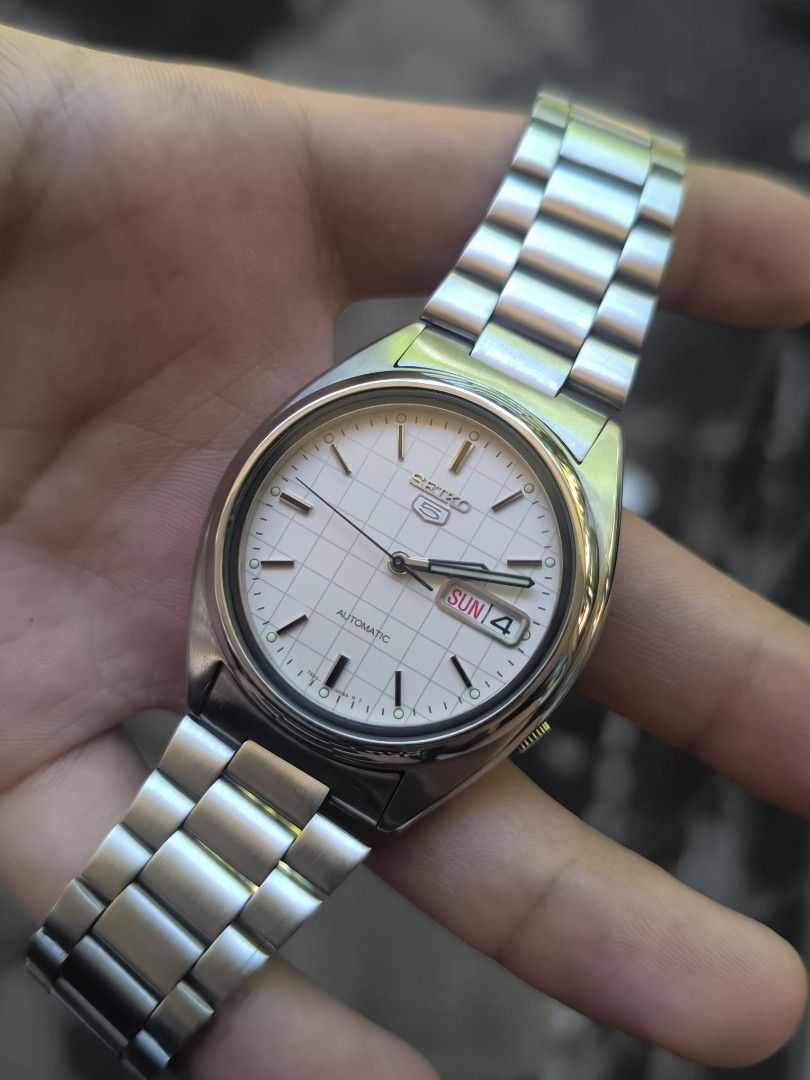 Seiko 5 SNXF05 (Category: Men's Watches) located in Iriga City. Submitted by chris569 (Listing ID 1465848595, Image 2). Description: FOR SALE❗❗ Seiko 5 "Grid Dial" Automatic SNXF05 PRICE: 3500 all original parts 7s26 automatic movement 37mm case diameter newly serviced open for nationwide shipping via LBC Iriga City, Camarines Sur location .