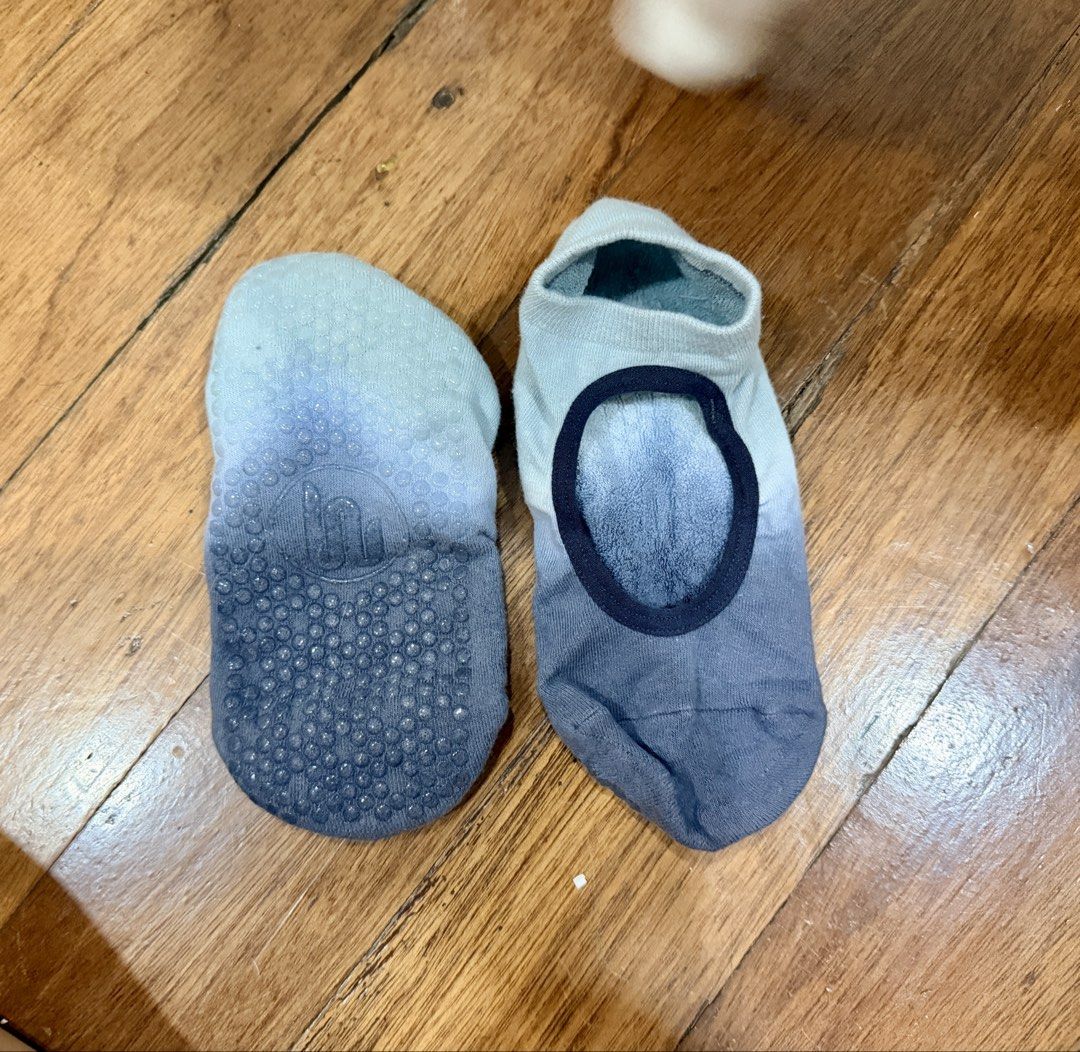 Set of 2 Move Active Yoga Socks (Category: Activewear) located in Quezon City. Submitted by bonkee_declutters (Listing ID 1465802886, Image 3). Description: - Includes 2 pairs of yoga/pilates grip socks (Gradient Blue & Grey) - Features anti-slip rubber dots on the soles for maximum traction and stability - Stylish cutout top and open instep design for breathability and flexibility - Made with soft, comfortable knit material - Low-cut ankle style