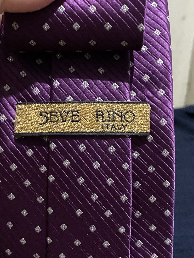 Severino Italy Purple Microfiber Necktie (Category: Ties) located in Manila. Submitted by resi.diaz (Listing ID 1465893662, Image 3). Description: - Brand: Severino Italy - Color/Design: Purple with textured stripe and square pattern - Material: 100% polyester microfiber - Size: Standard width and length - Condition: Clean, no stains or pulls - Best for: Work, formal events, and weddings.