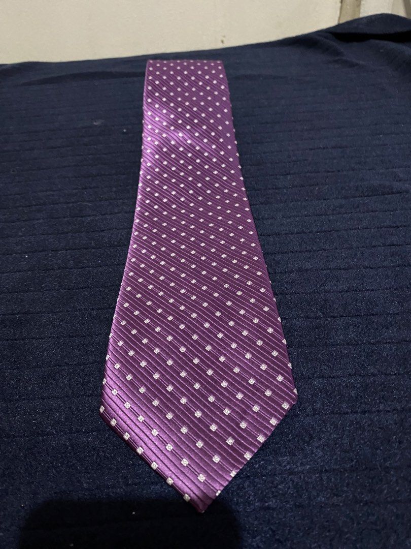 Severino Italy Purple Microfiber Necktie (Category: Ties) located in Manila. Submitted by resi.diaz (Listing ID 1465893662, Image 1). Description: - Brand: Severino Italy - Color/Design: Purple with textured stripe and square pattern - Material: 100% polyester microfiber - Size: Standard width and length - Condition: Clean, no stains or pulls - Best for: Work, formal events, and weddings.