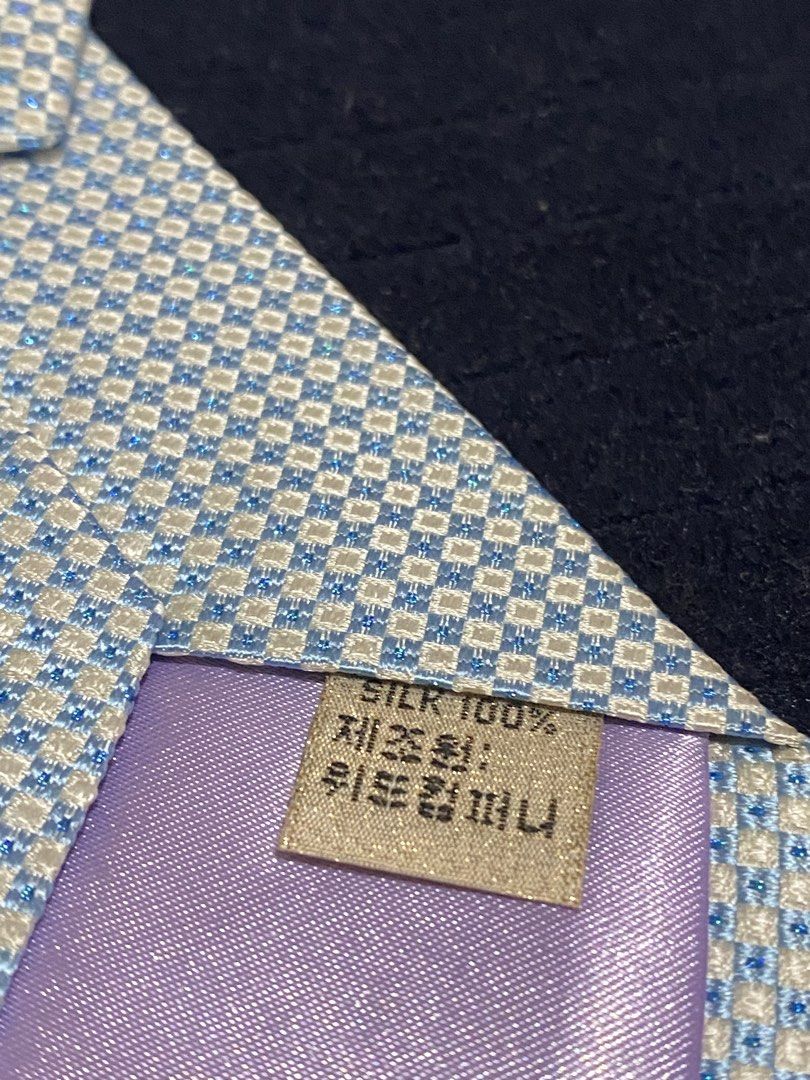 Severino Italy Silk Tie Blue White Checked (Category: Ties) located in Manila. Submitted by resi.diaz (Listing ID 1465858085, Image 3). Description: - Brand: Severino Italy - Design: Blue and white checked pattern with a nice textured weave - Material: 100% pure silk - Shape: Standard necktie with pointed tip - Condition: Excellent, with clean labels stitched on the back - Perfect for office wear, weddings, or formal occasions.