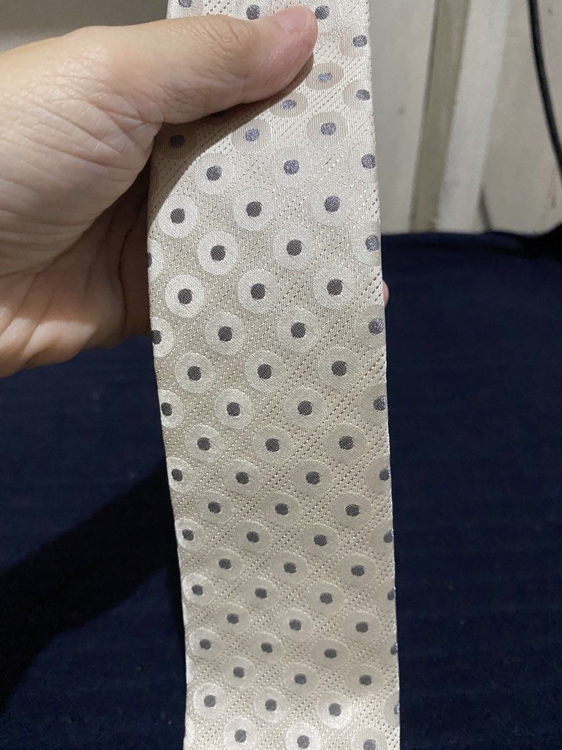 Severino Italy Silk Tie Cream Polka Dot (Category: Ties) located in Manila. Submitted by resi.diaz (Listing ID 1465861326, Image 2). Description: - Brand: Severino Italy - Color/Pattern: Cream with dots and geometric circles - Material: 100% pure silk, made in Korea - Size: Standard width necktie - Condition: Clean, no stains or damage - Best for: Formal events, weddings, and office wear.