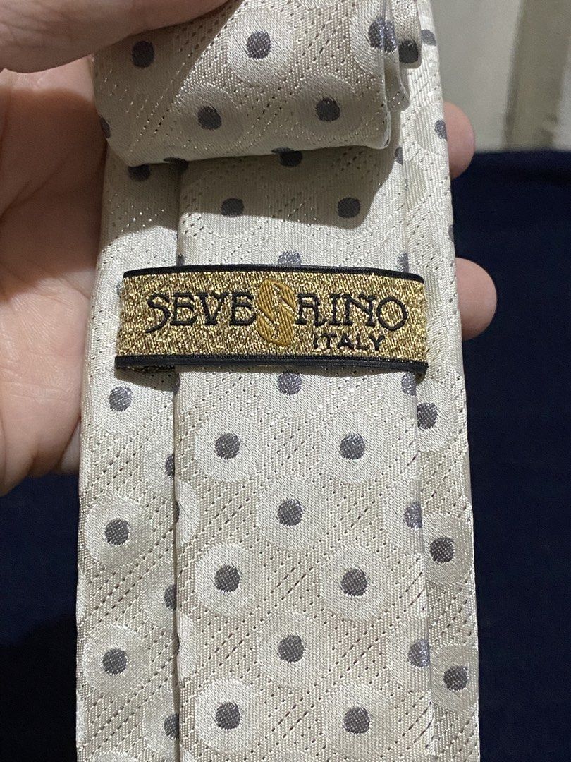 Severino Italy Silk Tie Cream Polka Dot (Category: Ties) located in Manila. Submitted by resi.diaz (Listing ID 1465861326, Image 3). Description: - Brand: Severino Italy - Color/Pattern: Cream with dots and geometric circles - Material: 100% pure silk, made in Korea - Size: Standard width necktie - Condition: Clean, no stains or damage - Best for: Formal events, weddings, and office wear.
