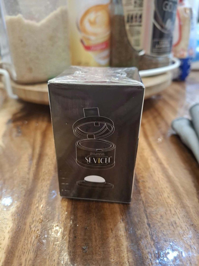 Sevich Hair Shadow Powder Root Touch Up (Category: Makeup) located in Quezon City. Submitted by KaelClay (Listing ID 1465776267, Image 2). Description: - Brand: Sevich Hair Shadow Powder - Function: Instantly covers roots and thinning areas - Packaging: Factory sealed in original box - Features: Compact container with built-in puff applicator for easy application - Condition: Brand new and never opened.