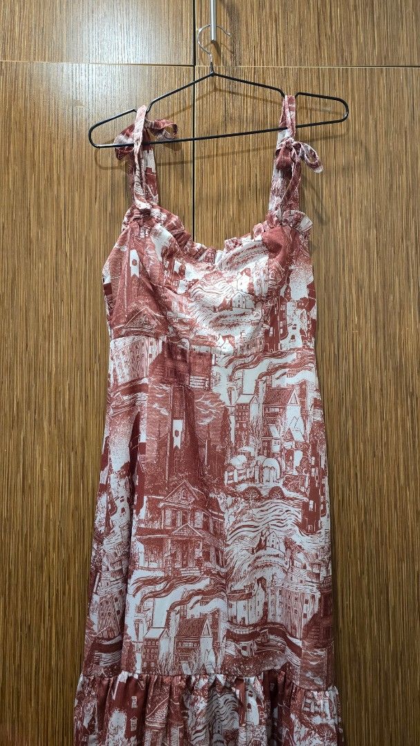 Shein Brown Midi Dress (Category: Dresses) located in Cebu City. Submitted by kitty_12345_ (Listing ID 1465911827, Image 2). Description: - Brand: Shein - Size: Small (S) - Design: Brown and white toile de jouy village print - Details: Square neckline, self-tie shoulder straps, ruffled trim - Fit: Fitted bodice with side zipper closure, flared tiered skirt MOP: gcash, mari, maya, gotyme MOD: Lbc, maxim Meetup: Parkmall.