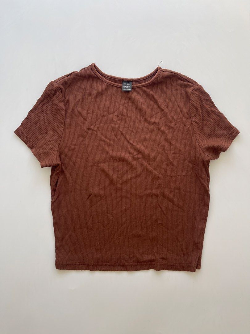 Shein Brown Tshirt (Category: Shirts) located in Bacolod City. Submitted by euniceclothing_coph (Listing ID 1465765289, Image 1). Description: S-M Stretchable cotton.