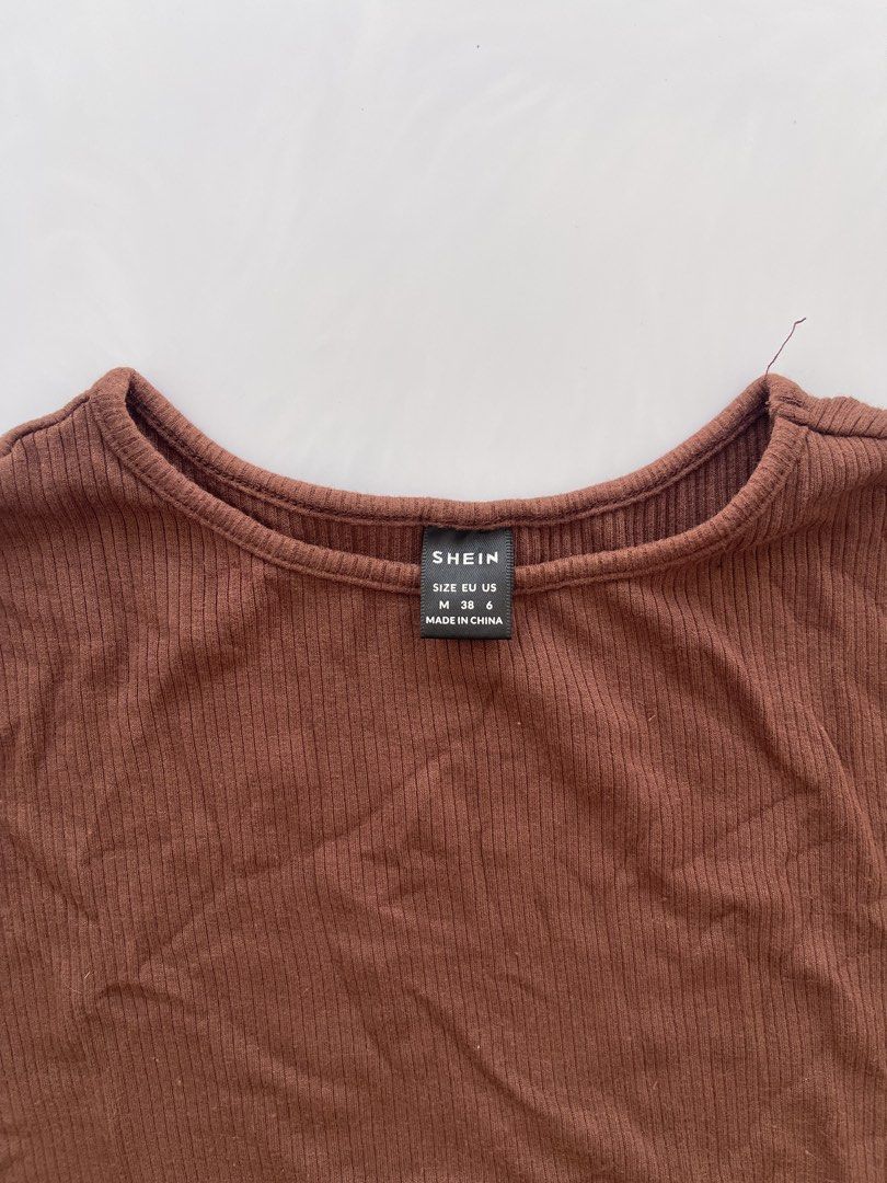 Shein Brown Tshirt (Category: Shirts) located in Bacolod City. Submitted by euniceclothing_coph (Listing ID 1465765289, Image 2). Description: S-M Stretchable cotton.