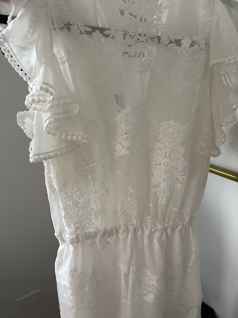 Shonajoy white ruffle romper (Category: Rompers) located in Caloocan City. Submitted by sophie.beaver08-33478 (Listing ID 1465771283, Image 3). Description: Hq fabric Small-med .