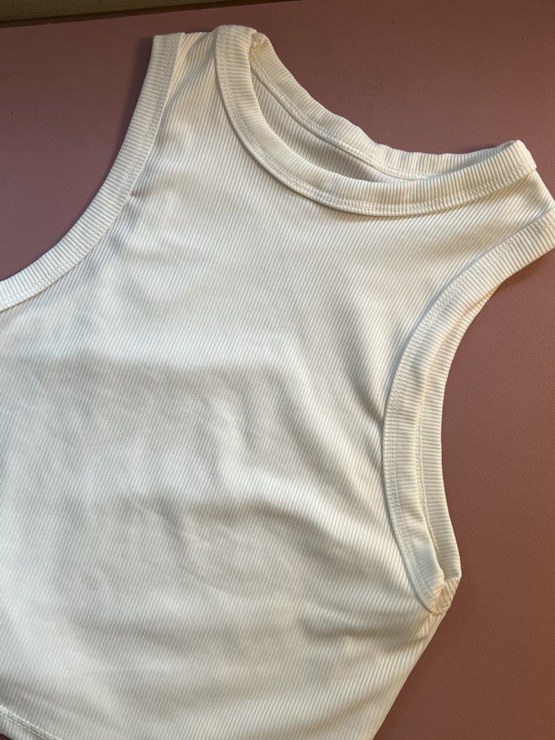 short white tank top (Category: Sleeveless) located in Davao. Submitted by hojichafromsips (Listing ID 1465891895, Image 1). Description: -dvo based -size XS - S -MOP: gcash -MOD: maxim meetup: jollibee circumferential rd. (near dmsf).