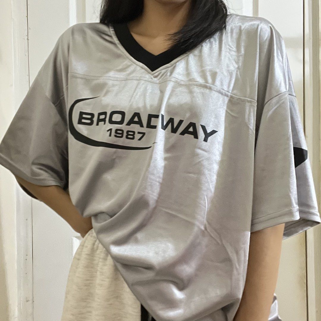 Silver Reflective Broadway Jersey Shirt (Category: Tshirts & Polo Shirts ) located in Marikina City. Submitted by preloved.mana (Listing ID 1463928088, Image 1). Description: - silver clothing, reflective when lightened - fit size large to XL - MOP: gcash, maya - MOD: lalamove, jnt, meet UST area - LOC: marikina.