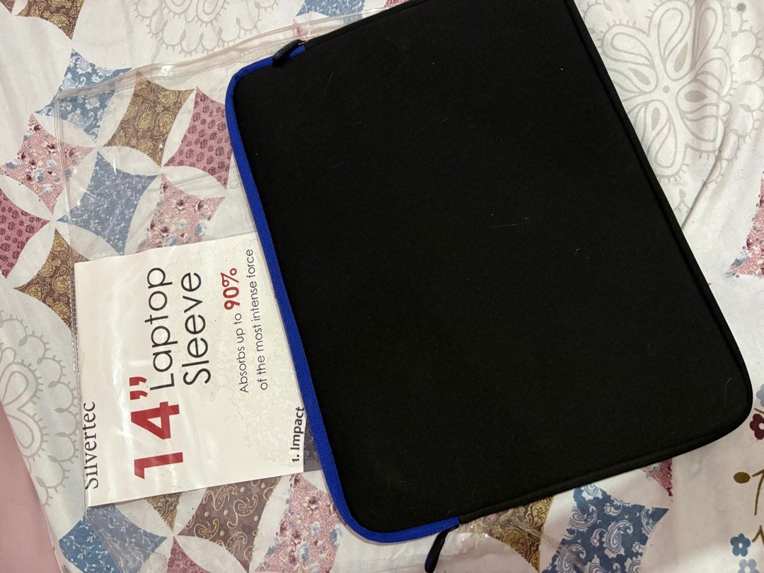 Silvertec 14" Laptop Sleeve (Black/Blue) (Category: Other Gadgets) located in Marikina City. Submitted by tricza (Listing ID 1465890578, Image 1). Description: Condition: Good as new (includes original packaging insert) Specs: Fits up to 14” laptops; impact-absorbing protective padding.