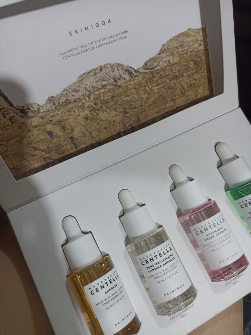 SKIN1004 Madagascar Centella Ampoule Kit Set 4x30ml (Category: Face Care) located in Pasay City. Submitted by mhy_closett (Listing ID 1465910768, Image 2). Description: - Brand: SKIN1004 Madagascar Centella - Set includes four 30ml ampoules: Centella, Tone Brightening Capsule, Poremizing Fresh, and Tea-Trica Relief - Condition: Brand new, unused in original presentation box with molded white tray - Great way to test different formulas before comm