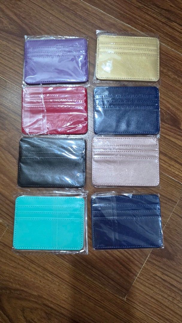 Slim PU Leather Card Holder Wallet Multiple Colors Available (Category: Wallets & Card holders) located in Quezon City. Submitted by highonspotlight (Listing ID 1465952963, Image 1). Description: - Sleek & Slim Design: Fits effortlessly into pockets or small bags without the bulk. - Dual-Sided Storage: Multiple card slots on both sides for easy organization of cards and cash. - Available Colors: Gold, Navy Blue, Rose Gold, Purple, Red, Black, and