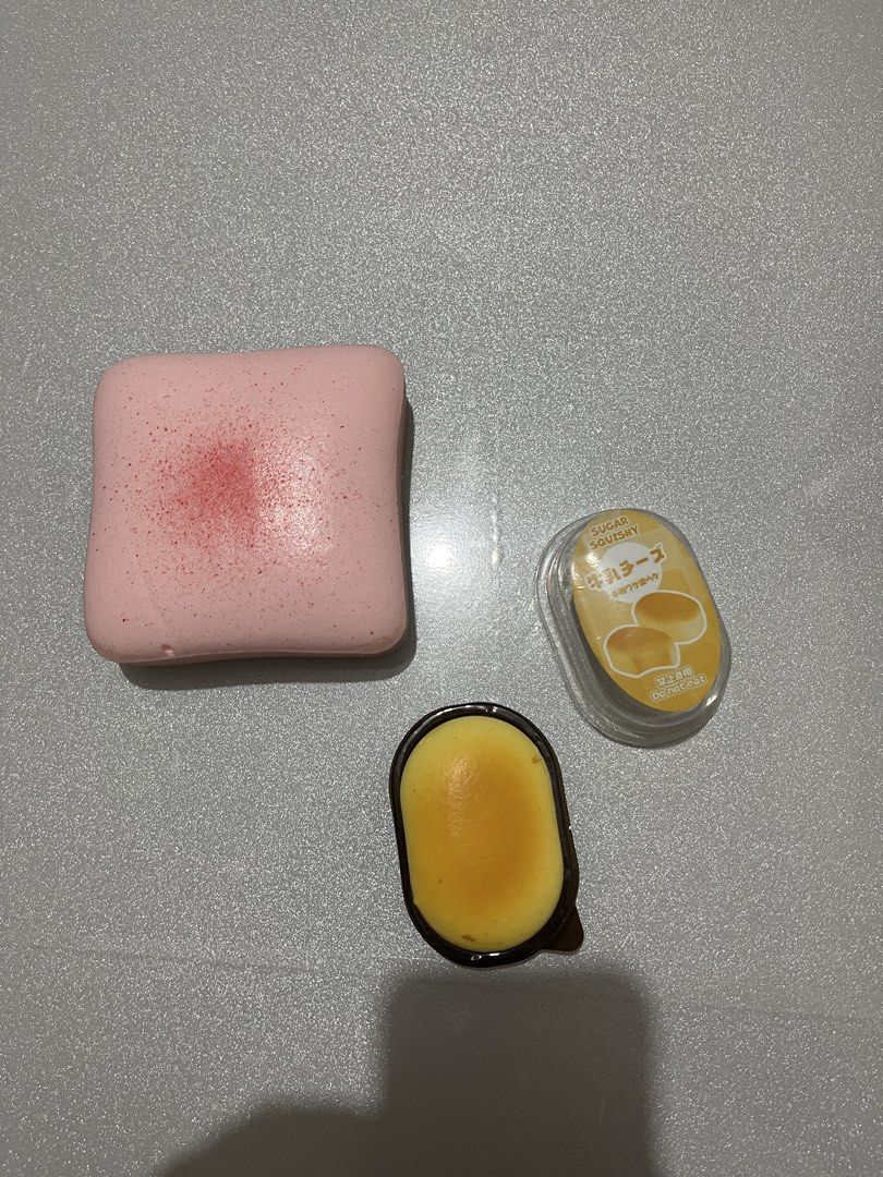 Slow Rising Squishies (Category: Kids Toys) located in Quezon City. Submitted by fracslaa (Listing ID 1465800412, Image 1). Description: - Set includes 2 super soft squishy toys - Pink cake-style squishy with red speckles - Mini yellow cheese squishy in original packaging - Great tactile toys for stress relief and collection - Selling as a bundle only.