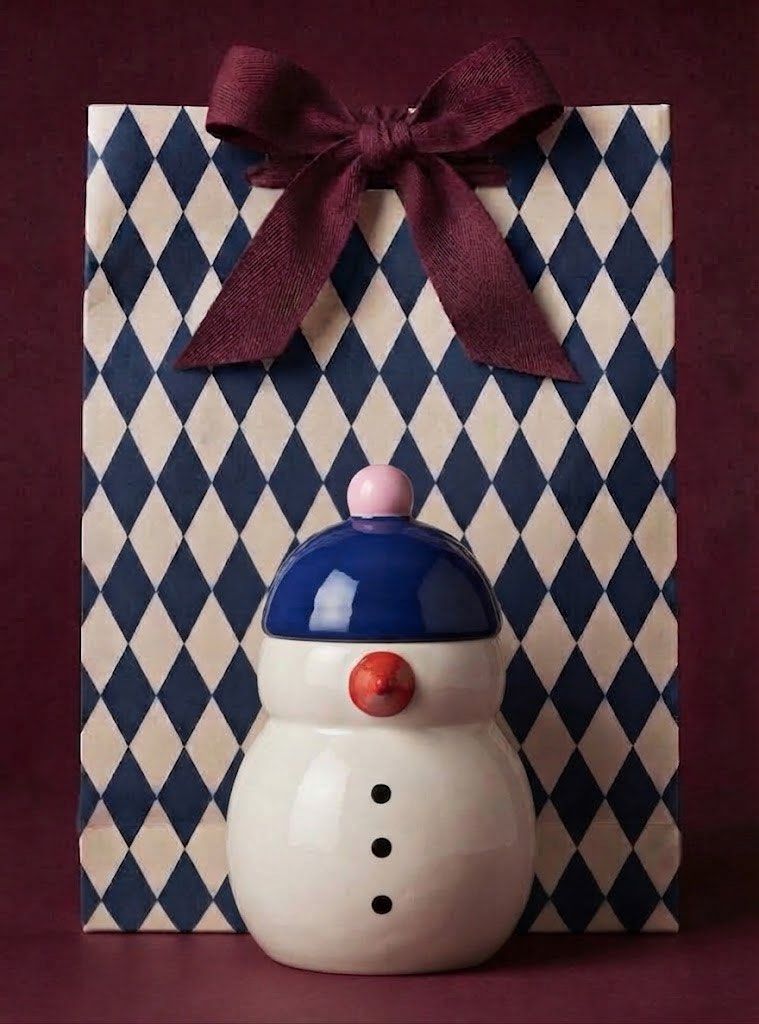 Snowman Ceramic Cookie Jar with Lid (Category: Food Organization & Storage) located in Baguio. Submitted by the_general_store (Listing ID 1465797454, Image 1). Description: - Adorable ceramic snowman jar with blue hat and pink top pom-pom - Features cute orange carrot nose and three black coal buttons - Medium size, perfect for holiday decor or storing kitchen treats - Easy-to-open top lid *Dimensions: height 8.25”, circumference 17”.