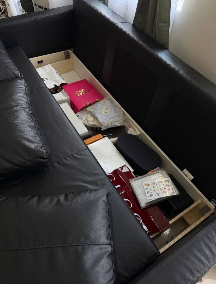 Sofa bed from IKEA (Category: Other Home Furniture) located in Taytay. Submitted by grace.bautista661 (Listing ID 1465771918, Image 3). Description: Moving out sale IKEA Sofa Bed with storage -Excellent condition, no issues. -Color: Black -Material: Faux Leather -3 seater -Easily converts from sofa into bed -With built-in storage compartment -Includes 3 pillows -Well maintained and recently cleaned ₱7,500 only (Originally bought for ₱29k+) For pi