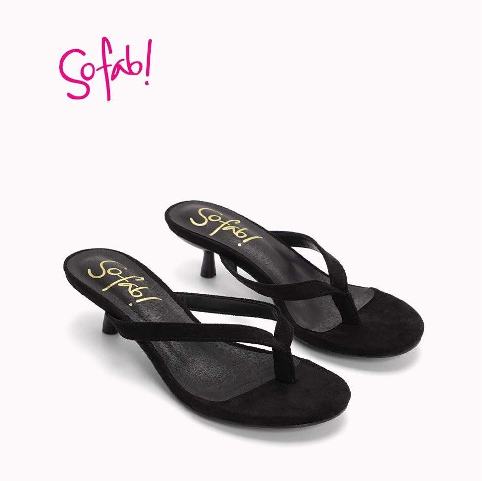 Sofab! Black Kitten Heel Thong Sandals (Category: Flats & Sandals) located in Taguig. Submitted by cftbncs (Listing ID 1465914917, Image 2). Description: - Brand: Sofab! - Style: Kitten heel thong sandals with slip-on design - Material: Black suede-look finish - Details: Gold brand logo on insole, clean strap silhouette - Condition: Fresh and untouched, ready to wear - Versatility: Perfect for casual outings or evening wear.