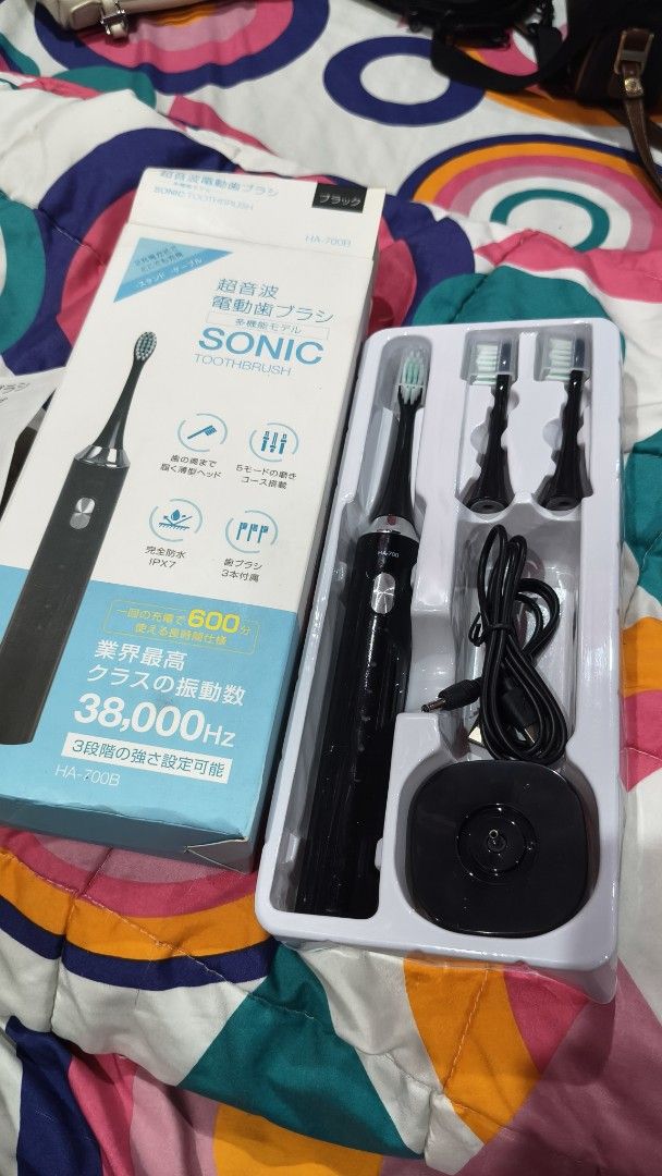 Sonic Electric Toothbrush Rechargeable (Category: Oral Care) located in Manila. Submitted by sharm26arm96276 (Listing ID 1465864028, Image 3). Description: - High vibration frequency at 38,000 Hz for deep cleaning - 5 brushing modes & 3 intensity settings for a customized experience - Waterproof IPX7 rating for safe use and easy cleaning - Complete set includes: 3 brush heads, charging base, USB cable, and manual - Comes in its original box (grea