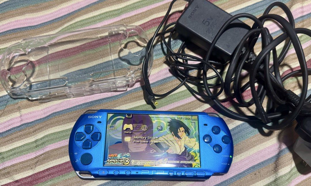 Sony PSP-3000 Vibrant Blue Handheld Console (Category: PlayStation) located in Quezon City. Submitted by angace13 (Listing ID 1465927513, Image 3). Description: selling my prelove psp 3000 vibrant blue no issue no history of repair with original charger with original crystal case with original sony mmc (supported) with 21 games installed already ready to use battery good na good pedeng pede pang gift or pang gamit pm nlng sa interested ty.