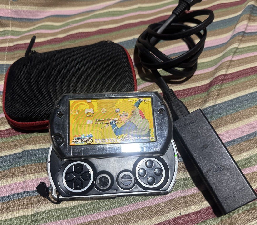 Sony PSP Go Handheld Console Black with Charger and Case (Category: PlayStation) located in Quezon City. Submitted by angace13 (Listing ID 1465928366, Image 1). Description: psp go 16gb black ready to use no issue with screen protector since day 1 with crystal case since day 1 with original charger with pouch with games already 35game + in internal and 4gb memory card battery last long pm nlng sa interested ty.