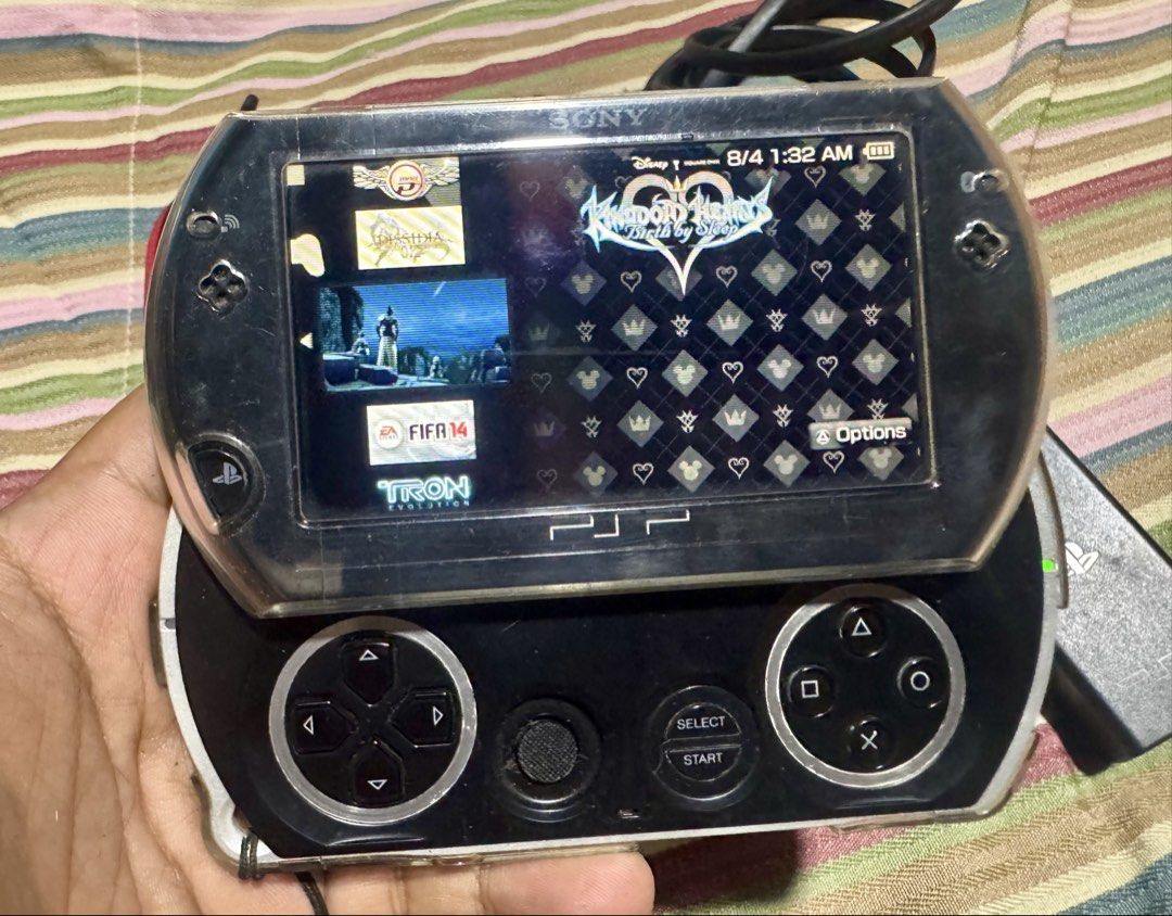 Sony PSP Go Handheld Console Black with Charger and Case (Category: PlayStation) located in Quezon City. Submitted by angace13 (Listing ID 1465928366, Image 2). Description: psp go 16gb black ready to use no issue with screen protector since day 1 with crystal case since day 1 with original charger with pouch with games already 35game + in internal and 4gb memory card battery last long pm nlng sa interested ty.