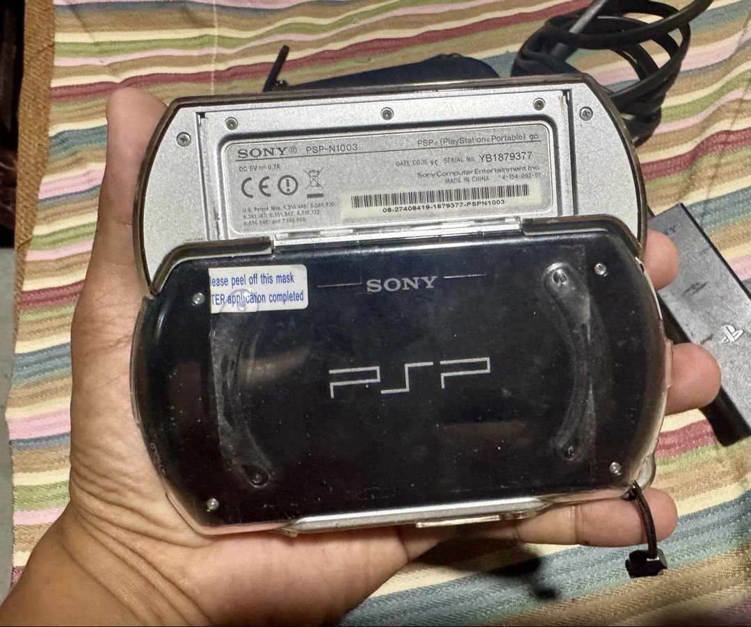 Sony PSP Go Handheld Console Black with Charger and Case (Category: PlayStation) located in Quezon City. Submitted by angace13 (Listing ID 1465928366, Image 3). Description: psp go 16gb black ready to use no issue with screen protector since day 1 with crystal case since day 1 with original charger with pouch with games already 35game + in internal and 4gb memory card battery last long pm nlng sa interested ty.