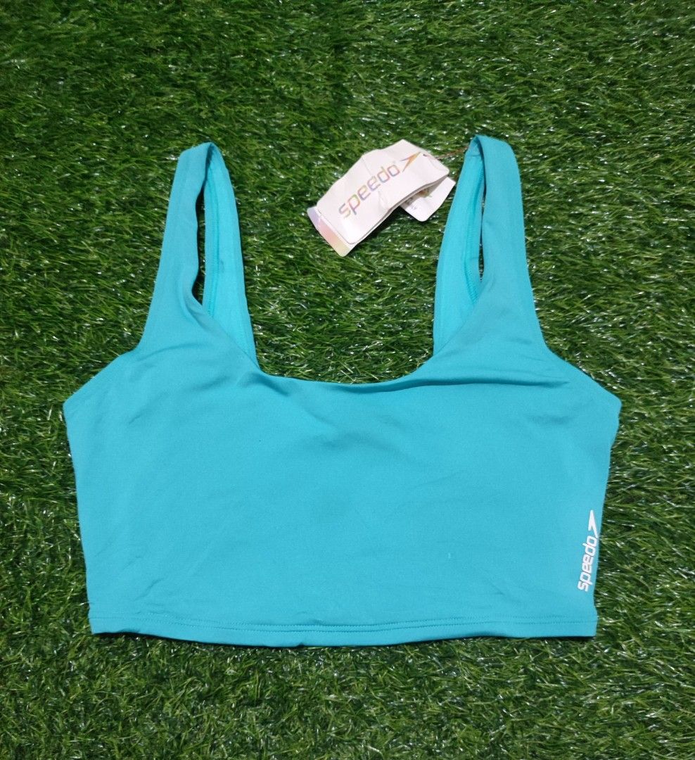 Speedo Gen Solid Bikini Top Turquoise (Category: Bikinis & Swimsuits) located in Cebu City. Submitted by deadjay84 (Listing ID 1465859333, Image 1). Description: - Brand: Speedo Gen - Style: Solid bikini top with square neckline and wide shoulder straps - Color: Bright turquoise blue with white logo on lower left band - Size: Small - Condition: Brand new with tags attached Pls see photos for details Cebu Loc Add shipping.