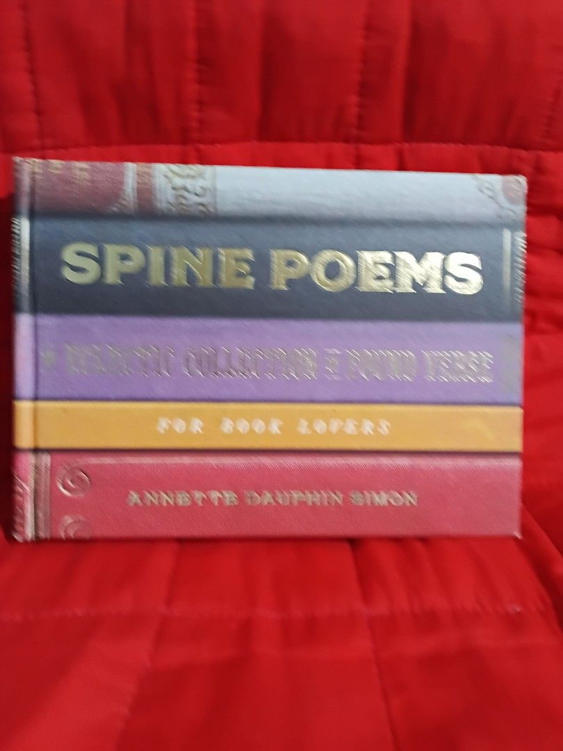 Spine Poems by Annette Dauphin Simon (Category: Storybooks) located in Manila. Submitted by krishna_ayanami (Listing ID 1465934400, Image 1). Description: - Title: Spine Poems by Annette Dauphin Simon - Format: Hardcover edition with vibrant spine photography - Features creative book spine poetry ideas and literary inspiration - Condition: Clean pages throughout - Ideal for book lovers, writers, and poetry fans.