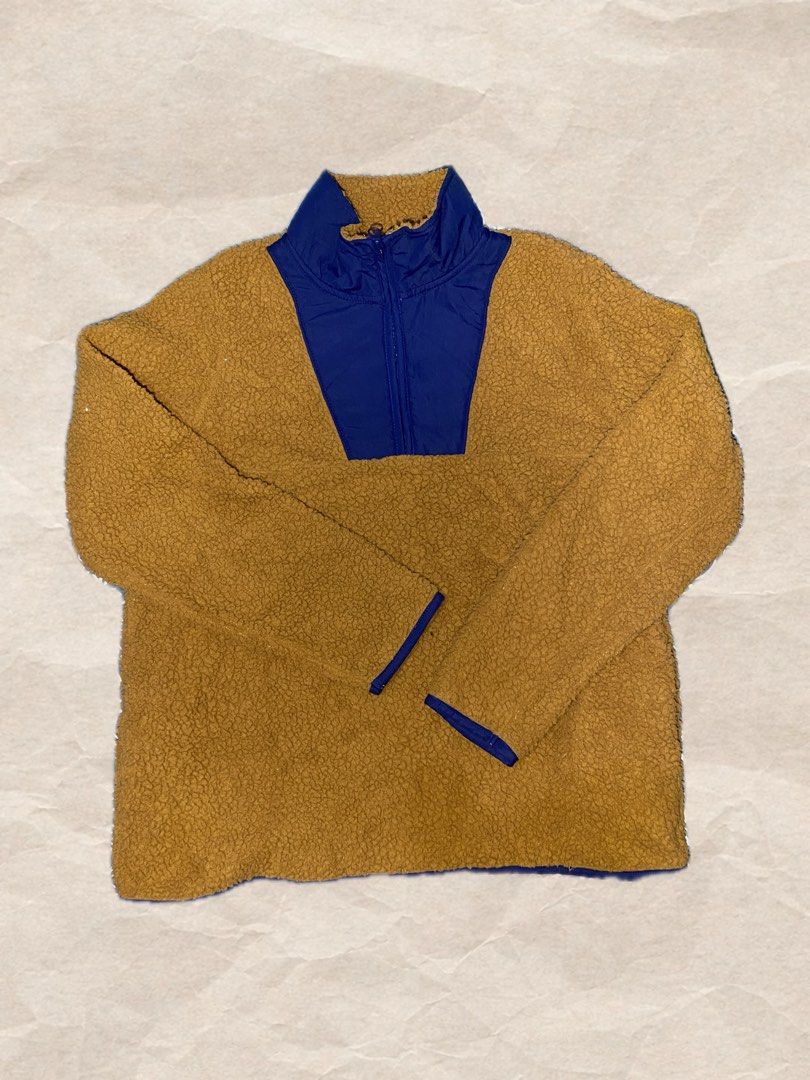 St. John's Bay Brown Blue Quarter Zip Fleece Pullover M (Category: Coats, Jackets and Outerwear) located in Rizal. Submitted by pcesspscl145 (Listing ID 1465917017, Image 1). Description: - Brand: St. John's Bay - Size: M - Color: Mustard brown with navy blue contrast panels - Material: Cozy fleece with nylon details - Features: Quarter-zip closure, stand-up collar, blue binding on cuffs and hem - Condition: Great layering piece for cold weather.