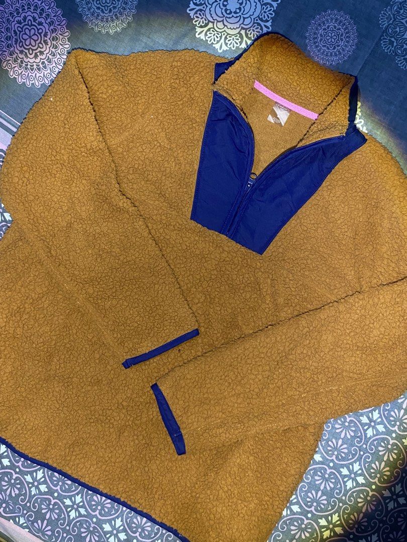 St. John's Bay Brown Blue Quarter Zip Fleece Pullover M (Category: Coats, Jackets and Outerwear) located in Rizal. Submitted by pcesspscl145 (Listing ID 1465917017, Image 2). Description: - Brand: St. John's Bay - Size: M - Color: Mustard brown with navy blue contrast panels - Material: Cozy fleece with nylon details - Features: Quarter-zip closure, stand-up collar, blue binding on cuffs and hem - Condition: Great layering piece for cold weather.