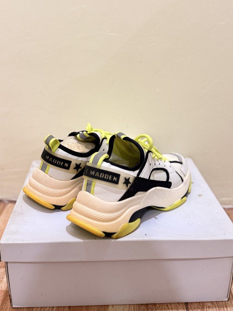 Steve Madden Gradually White Mult Sneakers Size 7 (Category: Sneakers) located in Quezon City. Submitted by cndcvrtc (Listing ID 1465938563, Image 2). Description: - Brand: Steve Madden - Model: Gradually - Color: White Multi with Neon Yellow Laces & Black Accents - Size: US 7 - Features: Bold chunky silhouette & star detailing on back heel tabs - Inclusion: Original box included - Condition: Excellent / Ready to ship.