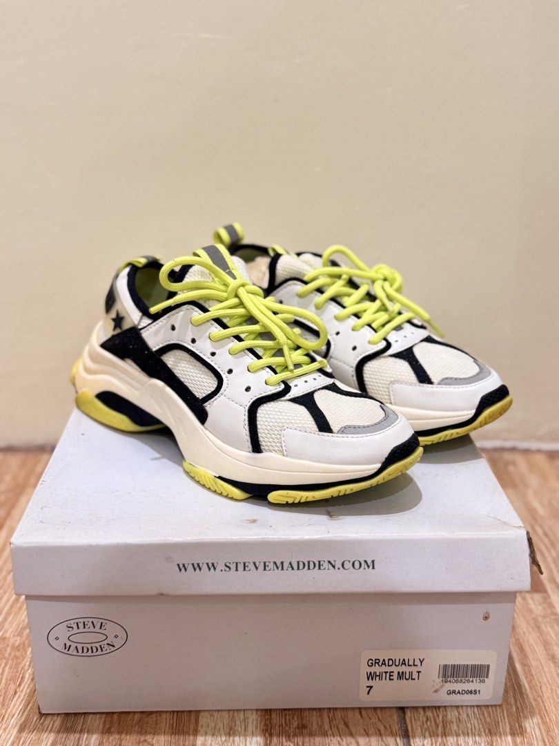 Steve Madden Gradually White Mult Sneakers Size 7 (Category: Sneakers) located in Quezon City. Submitted by cndcvrtc (Listing ID 1465938563, Image 1). Description: - Brand: Steve Madden - Model: Gradually - Color: White Multi with Neon Yellow Laces & Black Accents - Size: US 7 - Features: Bold chunky silhouette & star detailing on back heel tabs - Inclusion: Original box included - Condition: Excellent / Ready to ship.