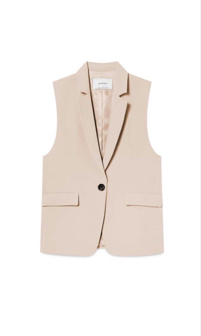 Stradivarius Tailored Beige Blazer Vest Size S (Category: Coats, Jackets and Outerwear) located in Pasay City. Submitted by closetbykim (Listing ID 1465788870, Image 1). Description: - Brand: Stradivarius - Size: S - Color: Versatile beige / neutral - Style: Sleeveless blazer vest with lapel collar and single front button closure - Perfect for: Smart casual outfits, office wear, and stylish layering.