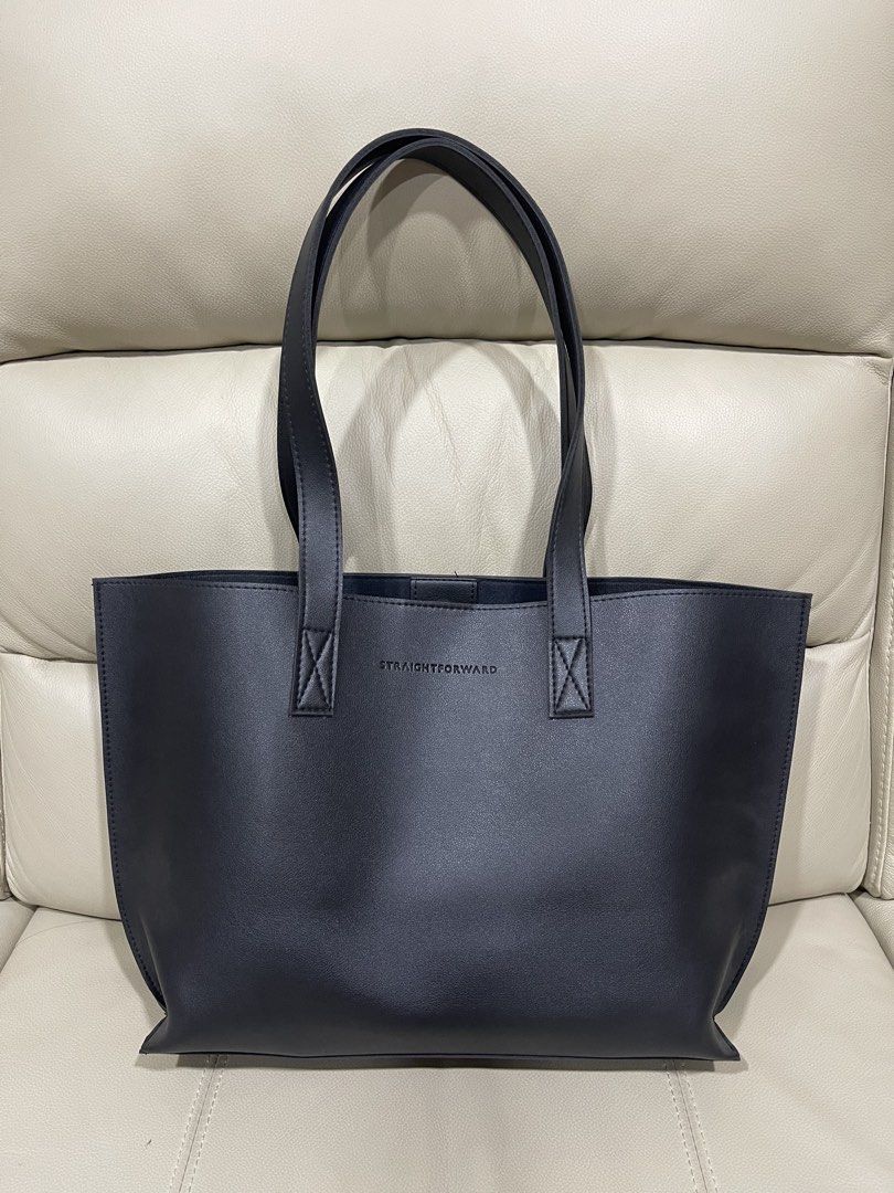 Straightforward Black Leather Tote Bag (Category: Tote Bags) located in Quezon City. Submitted by andreaa20 (Listing ID 1465804511, Image 1). Description: Straightforward tote bag made of leather. Used only once. Rfs: decluttering. .