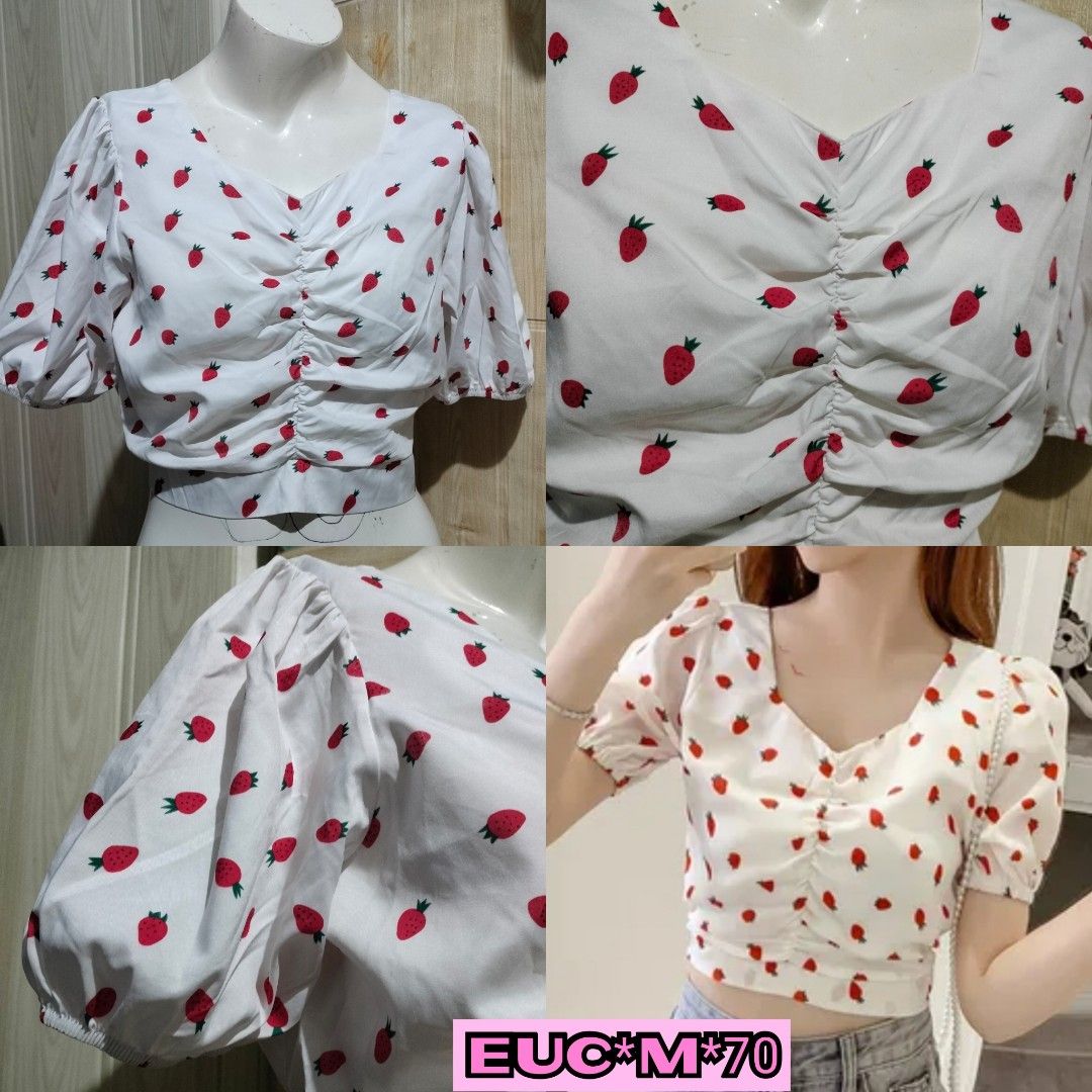 Strawberry Print Puff Sleeve Crop Top (Category: Blouses) located in Pateros City. Submitted by GandakaHandpick2.0 (Listing ID 1465883772, Image 1). Description: - Style: White crop top with all-over red strawberry pattern - Details: Short puff sleeves, square neckline, and gathered drawstring front - Size: Fits Medium - Material: Lightweight and comfortable for warm weather.