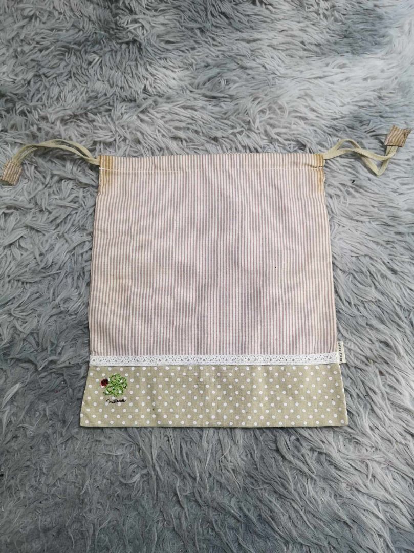 Stripe With Polka Dotted Design Pouch (Category: Purses & Pouches) located in Santa Cruz. Submitted by jmy_surplus.2 (Listing ID 1465897323, Image 1). Description: Size ; L - 12 W - 11.4 Color ; Beige Type ; Pouch Brand ; No brand Material ; Nylon Style ; Drawstring Beige Pouch LR 129 JMY 5 Batch #224.