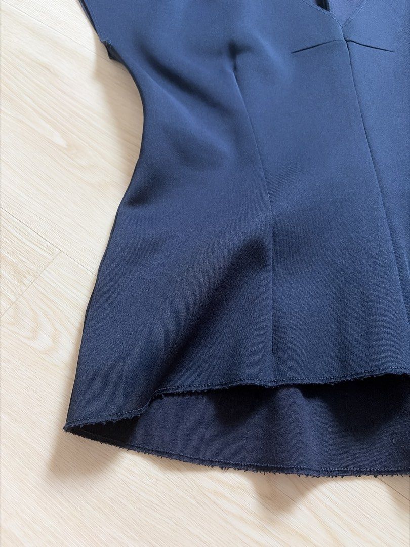 Structured Blouse (Category: Blouses) located in Singapore. Submitted by siberry (Listing ID 1465840765, Image 3). Description: Ptp 18” Length 23” Structured neoprene material No trades no negos no fussies no further measurements, just trying to clear Mailing can be combined for 2 items.