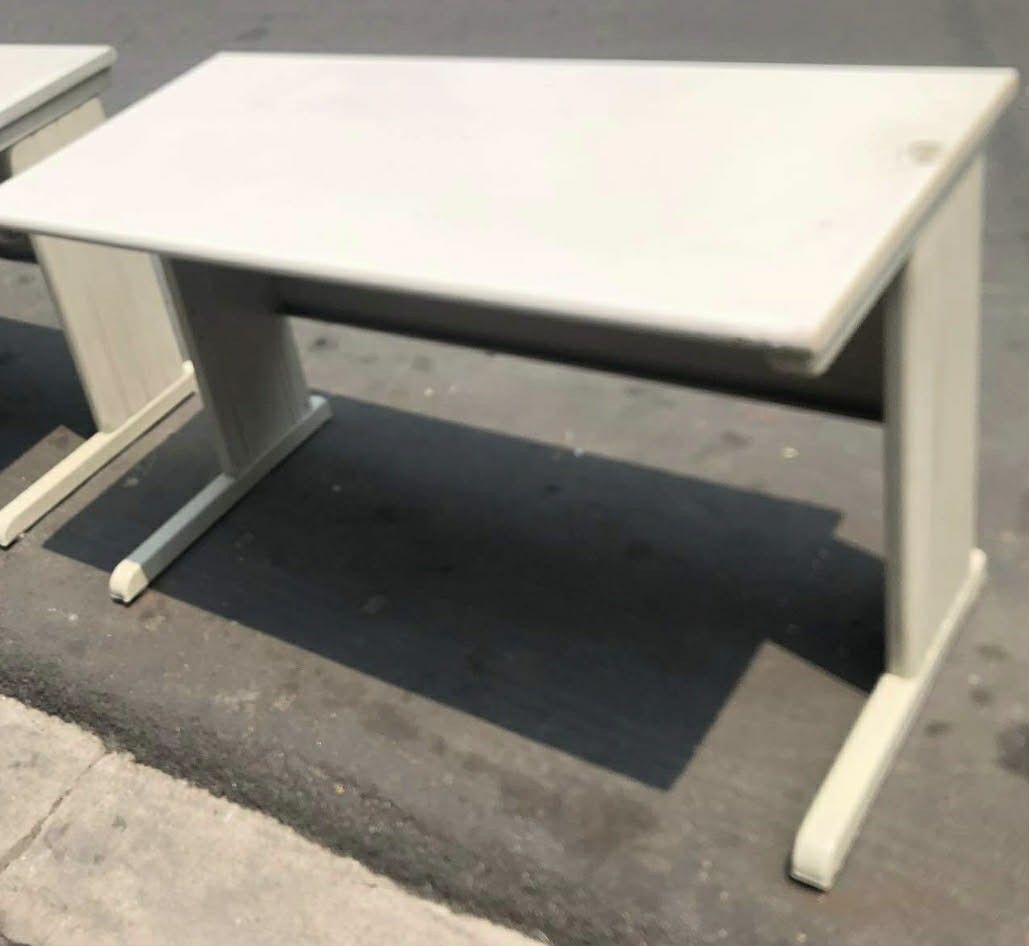 Sturdy Off-White Office Desk with T-Legs (Category: Office Furniture & Fixtures) located in Manila. Submitted by cleverocean.10acf9 (Listing ID 1465770084, Image 1). Description: - Type: Solid office desk / study table - Color: Clean off-white (neutral, matches any setup) - Build: Heavy-duty and stable with sturdy panel legs - Features: Spacious surface for laptops, monitors, and paperwork; easy to clean - Fulfillment: Ready for pickup or deliver