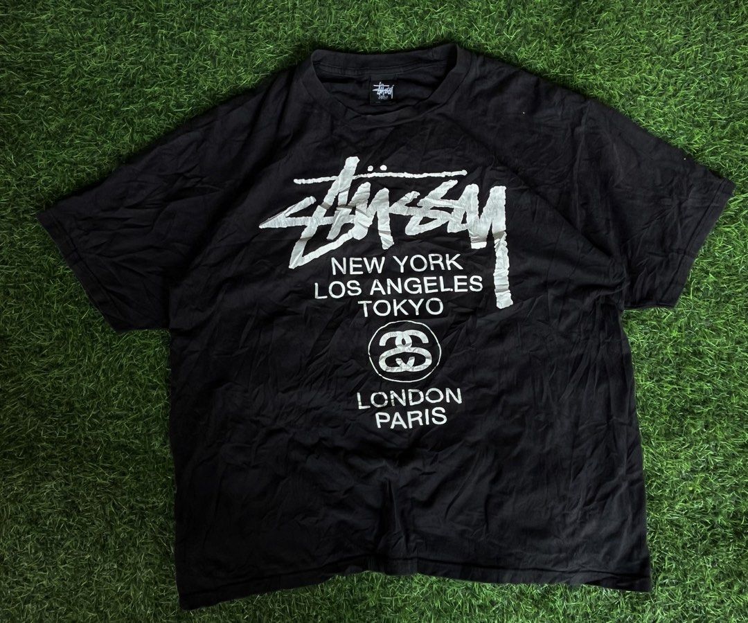 STUSSY WORLD TOUR TEE (Category: Formal Shirts) located in Carcar. Submitted by thrift_kidd (Listing ID 1465780410, Image 1). Description: Large on tag Dimes: 22x25 Excellent Cracks on print DM TO PURCHASE 📩.