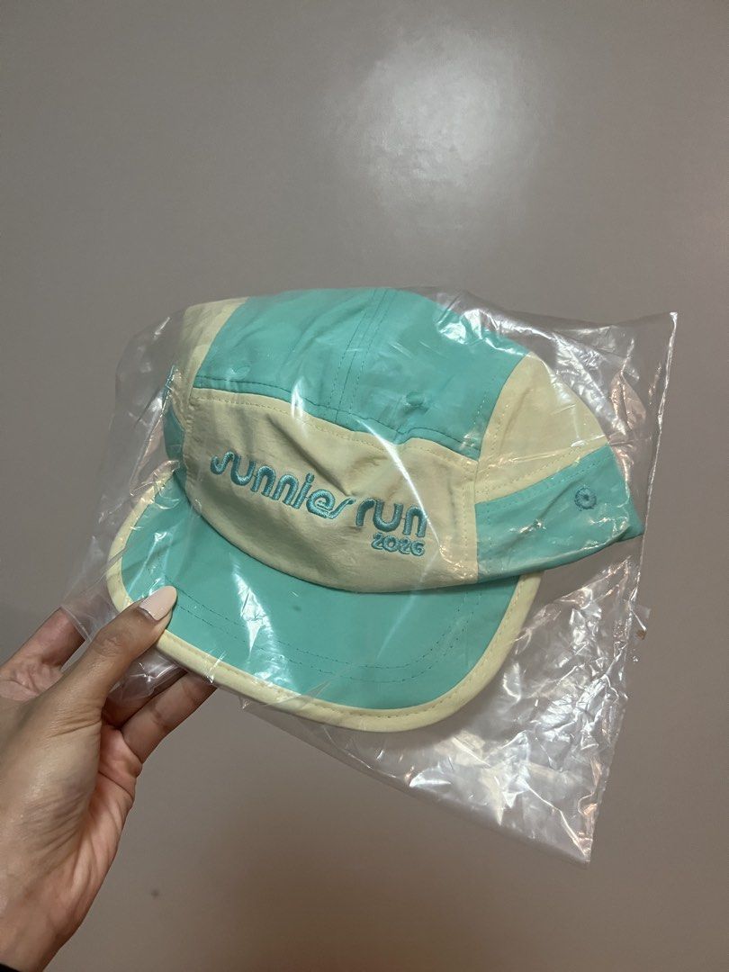 Sunnies Run 2026 Cap (Category: Activewear) located in Paranaque City. Submitted by andwea (Listing ID 1465907617, Image 1). Description: Not a cap wearer! Ran the race without it Condition: Brand new, still sealed in original plastic wrapper (unopened and untouched).