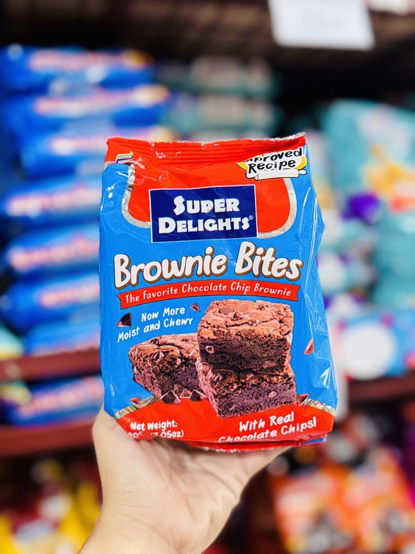 Super Delights Brownie Bites and Assorted Bites 180g (Category: Packaged & Instant Food) located in Cavite. Submitted by sweetbella15 (Listing ID 1465855338, Image 1). Description: - Super Delights Treats (180g per pack) - Available flavors: Brownie Bites, Butterscotch Bites, Browniescotch, and Ube Bites - Moist and chewy with real chocolate and caramel chips - Brand new and sealed in original packaging - Direct from store shelves.
